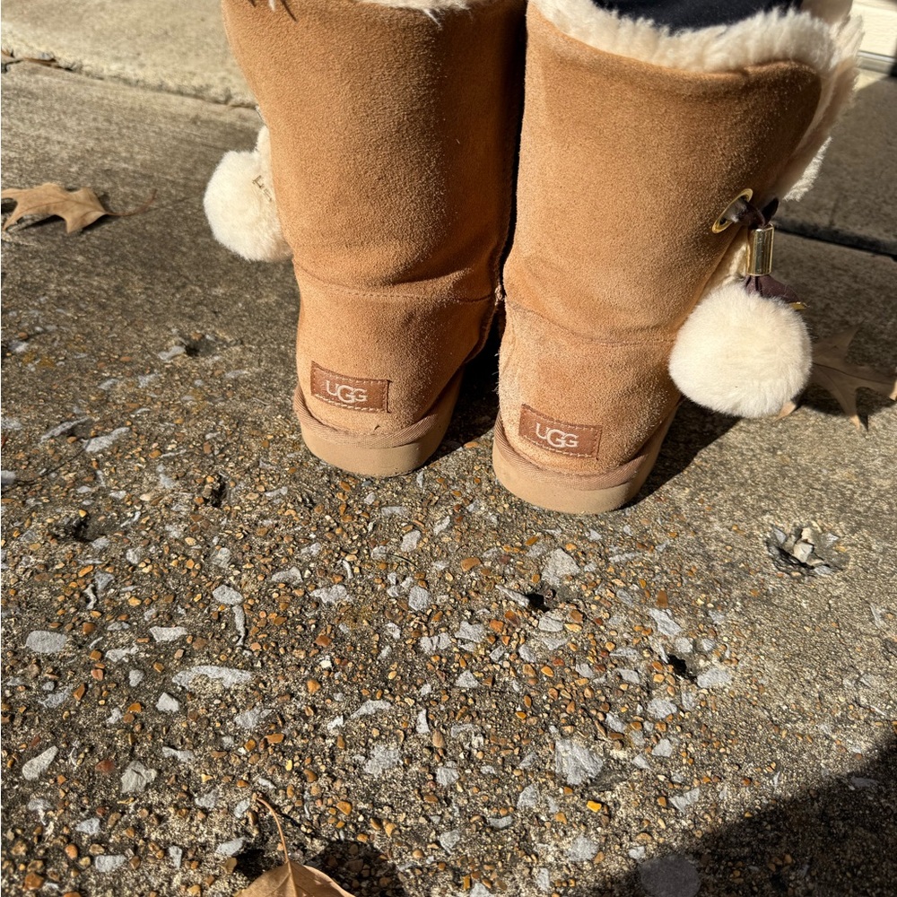 UGG Brown Boots with Cream Pom Poms